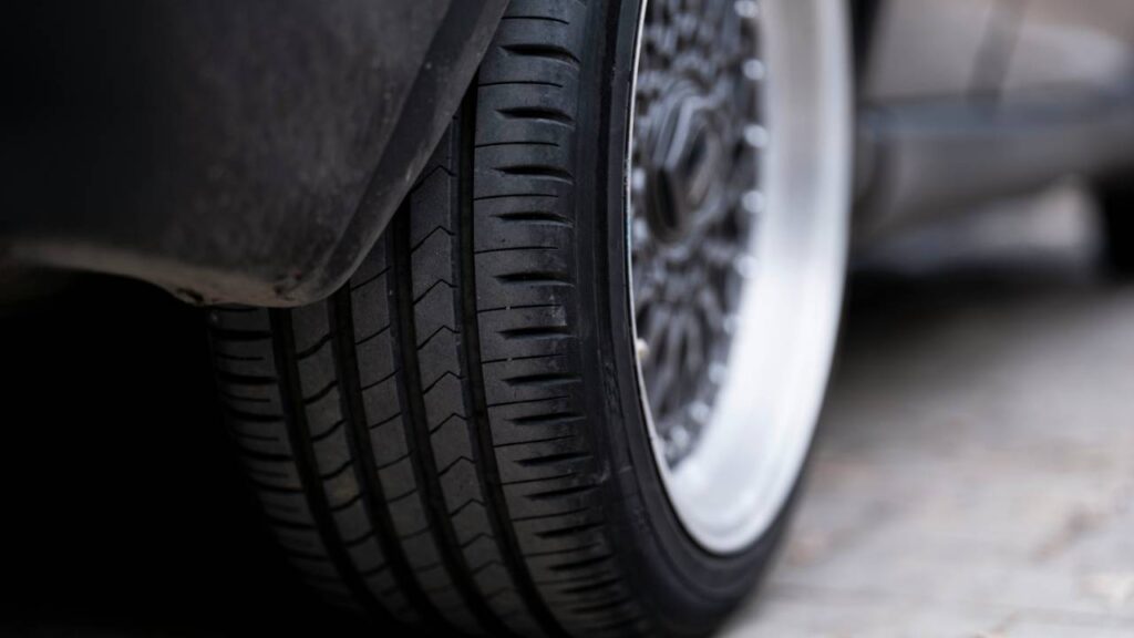 A closeup photo of an automobile's tyre