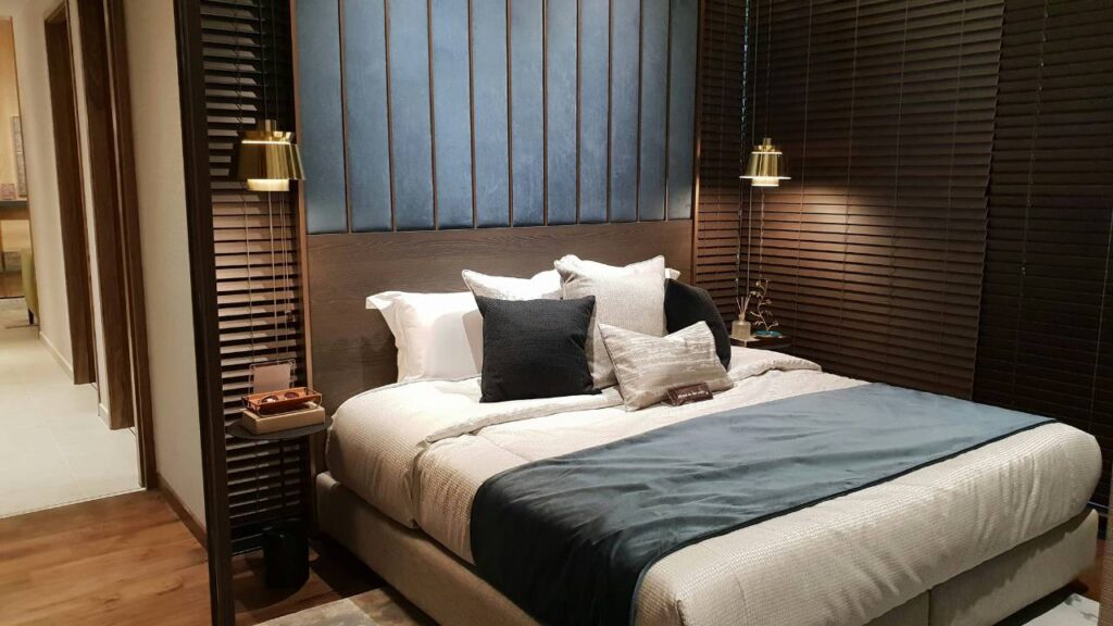 A photo of an elegant hotel bed 